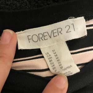 Black and pink striped shirt.